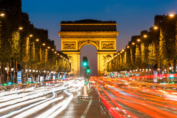 the Arc de Triomphe in Paris by night