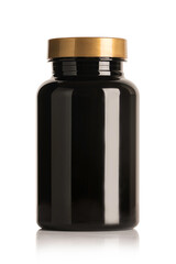 Black supplement bottle isolated on white