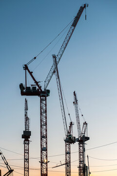 construction cranes at dawn in Paris