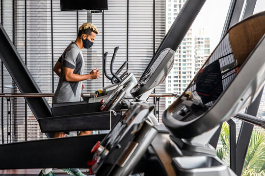 Fitness Trainer Demonstrates Safety with Mask and Social Distancing
