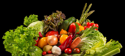 Organic food, vegetables, ecologically fresh food delivery concept. Close-up, side view isolated on black background.