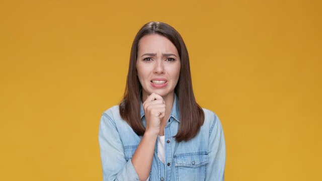 Anxious lady share novelty trouble isolated beige mustard color background