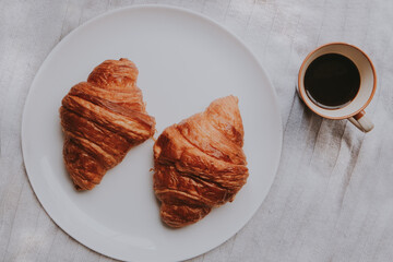 Parisian coffee table with croissant
