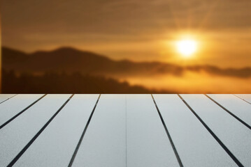 Modern looking wooden table top. Space design ideas for trade show, product, design, advertisement, free space for you. Natural blurred morning sunrise background