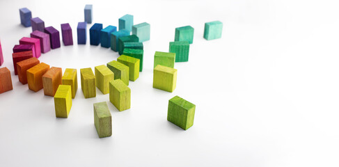 Gathering, centralization of data and people, concept image. Circle of colorful wooden blocks...