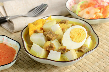 Lontong Kari Sapi, Ketupat with Beef Curry Soup. This is a Traditional Food, typically of Bandung, Indonesia.