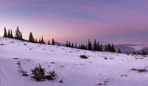 Panoramic view of the Apuseni mountains, at sunset, in winter in