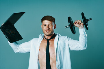 a man in a shirt with a pumped-up body laptop dumbbells business office