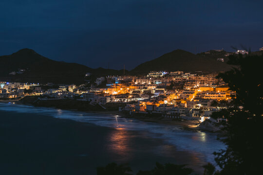 night landscape, waterfront house, waves, from above, long exposure