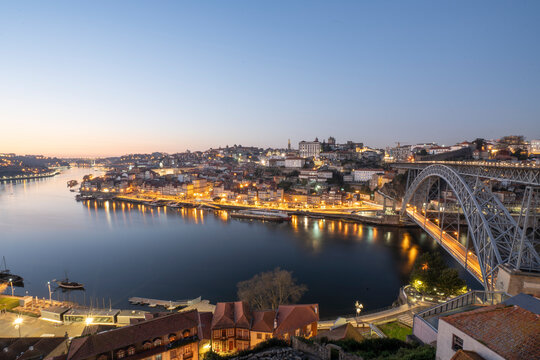 WS panorama of Oporto city, iconic bridge and Douro river at night