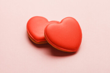 Two heart shaped cakes on pastel pink background, love, marriage concept, Valentines day card