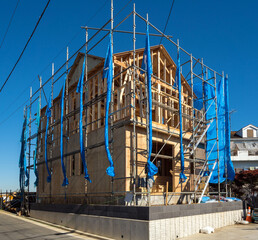 Facade of Wooden house under construction