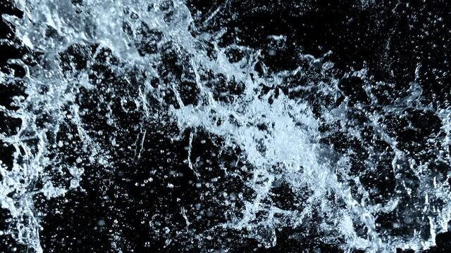 Super Slow Motion Shot of Water Splash Isolated on Black Background at 1000fps.