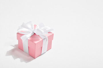 Two gift boxes on a pink background. Background for Valentine's Day.