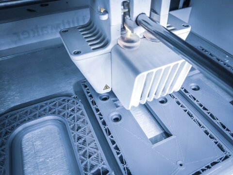 3D printer, printing with plastic wire filament in additive manufactur - Powered by Adobe