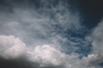 Dramatic White Puffy Clouds against a Blue Sky