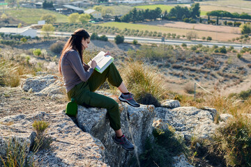 Woman explorer and geographer analyzes the environment