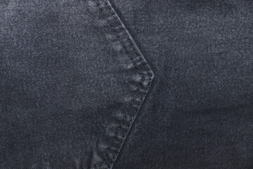 Black jeans surface close up texture