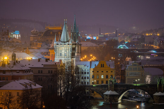 Old Town Bridge Tower, National Theatre and Charles bridge at night in winter, Prague, Czech Republic