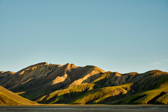 Mountainous terrain on sunny summer day