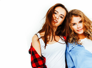 best friends teenage girls together having fun, posing emotional on white background, besties happy smiling, lifestyle real people concept close up. making selfie