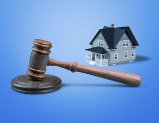 Gavel wooden and house for home buying or selling of bidding or lawyer, real estate and building concept.
