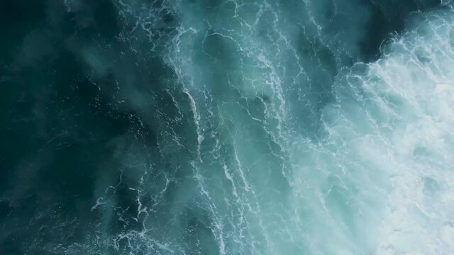 Birds Eye POV over waves and surfer, Cronulla Point, NSW