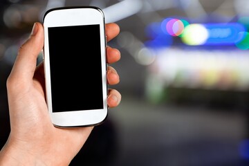 Hand hold a smartphone with a blank screen