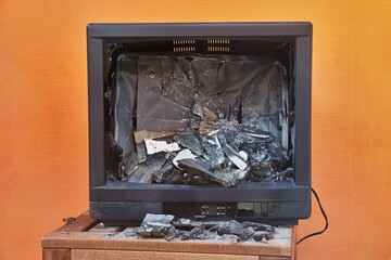 Old TV smashed to pieces - 473439635