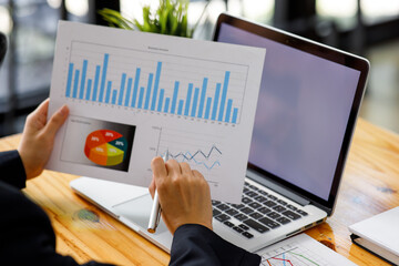 Business Woman working at office with documents on his desk, doing planning analyzing the financial report, business plan investment, finance analysis concept