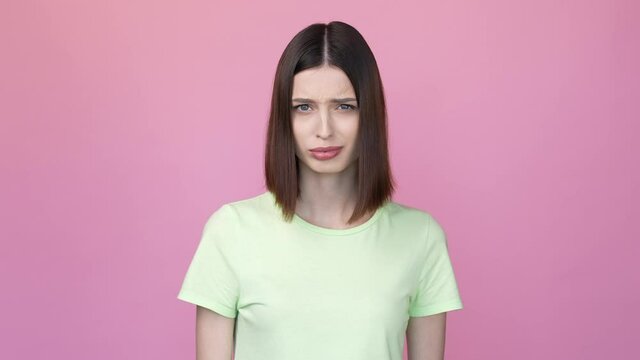 Frustrated lady ignore bad scent close nose isolated pink color background