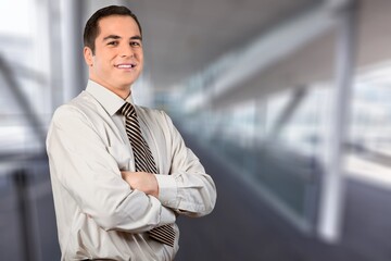 Obraz premium Smiling happy successful manager confident businessman looking at camera standing