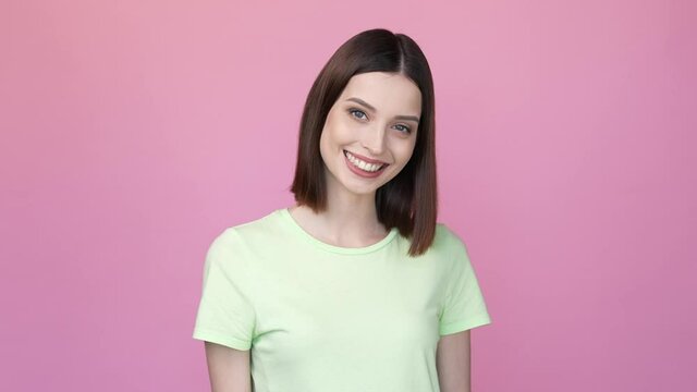 Good mood lady waving arm hello friend webinar isolated pink color background