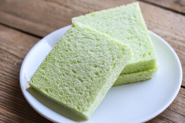 sliced bread on white plate, pandan bread sandwich