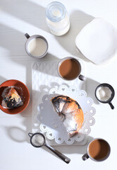 Marble Cake with Coffee with Powder Sugar and Kitchen Vintage Utensil, White Bakery Concept