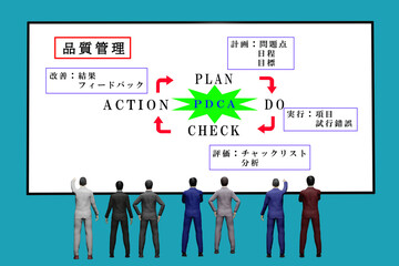 大きいモニターを前にしてビジネスマンが打ち合わせをするイメージ