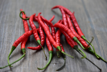 Red Chili Curly, is classified as either a vegetable or a condiment, depending on how it is used. As a condiment, spicy chilies are very popular in Indonesia as a food flavor enhancer