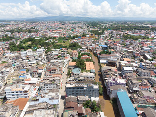 Aerial view from a drone that shows the border town of Mae Sai District, Thailand, And international immigration Tachileik District Of Myanmar