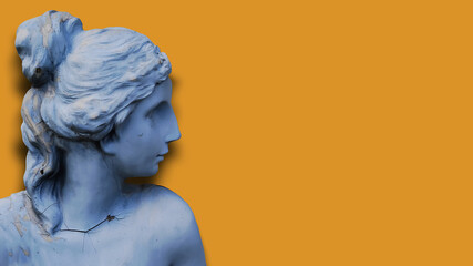 cracked antique lady statue classical sculpture art on yellow orange background