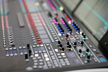 digital mixing console in a broadcasting studio