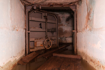 a sealed door in a flooded shelter