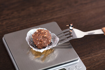 Miniature creative chef faces his own desserts