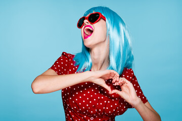 emotional woman blue wig sunglasses posing fashion - obrazy, fototapety, plakaty