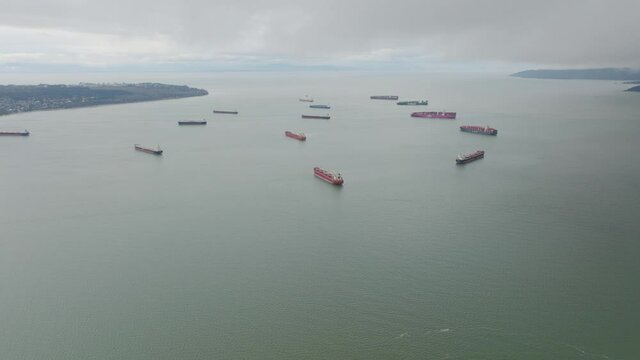 aerial footage of cargo ship backlog in the pacific ocean, Vancouver, British Columbia, Canada