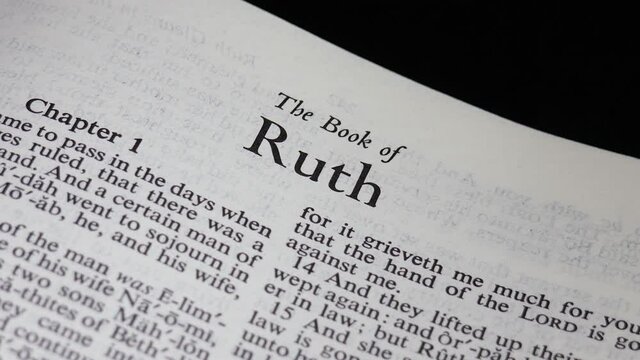 Close up shot of Bible Turning to the Book of Ruth