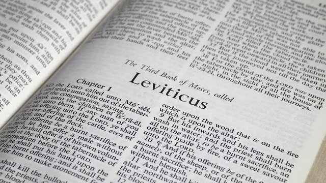 Close up shot of Bible Turning to the Book of Leviticus