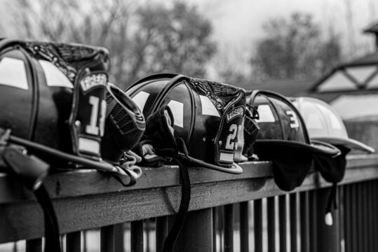 Firefighter helmets on railing