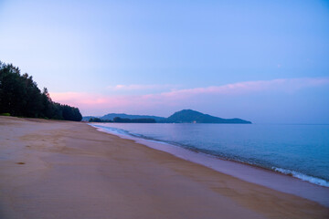 Early morning sunrise on Mai Khao Beach on Phuket Island, Surat Thani Province, Thailand.