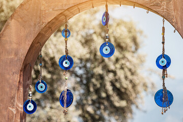An amulet against the evil eye is a traditional decoration hanging at the entrance to the house....