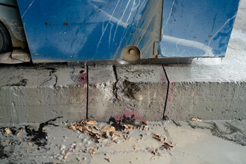 concrete cutting machine The concrete slab is being cut apart at the construction site.